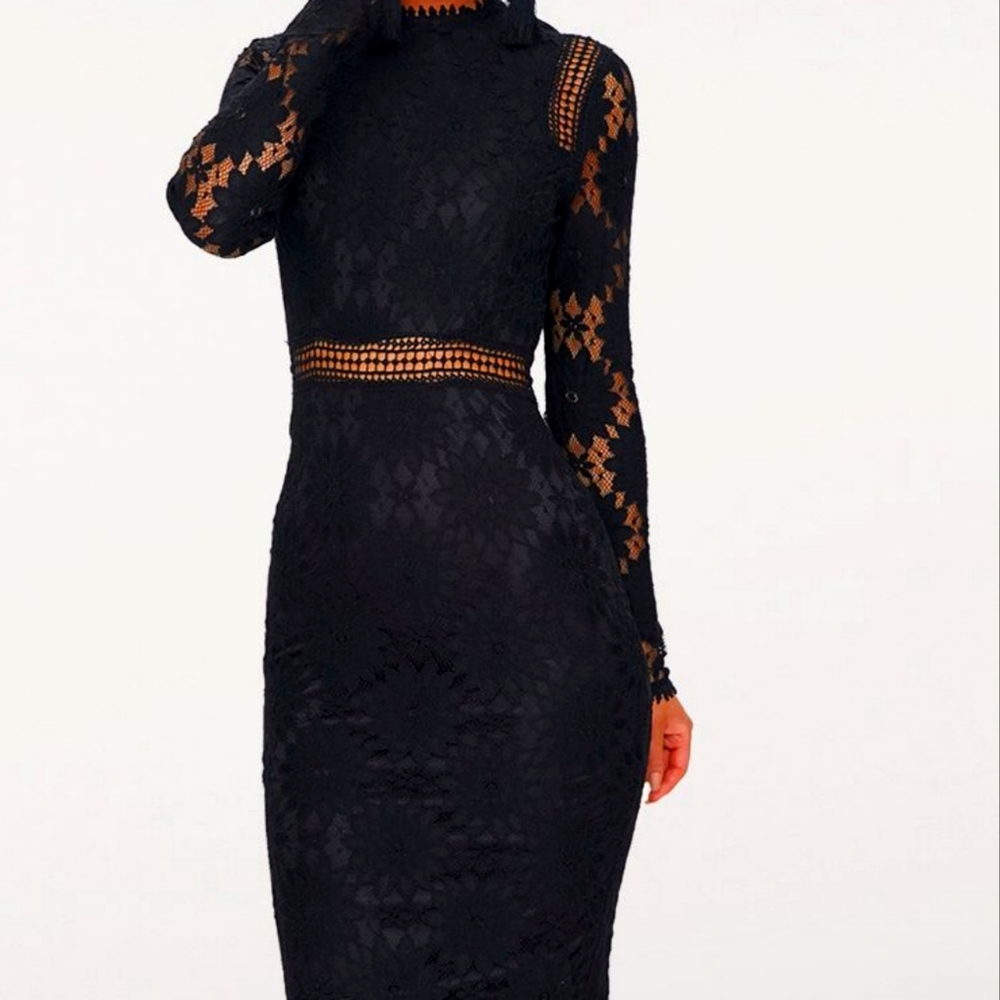 Elegant yet sexy black lace dress. New with tags